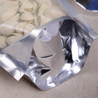 k φύλλο αλουμινίου αργιλίου που στέκεται επάνω τις σακούλες Resealable με το διαφανές μέτωπο